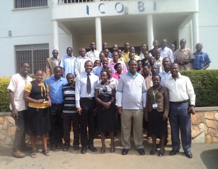 Insurance Group Agents, Health Partners and ICOBI staff pose for a photo with the Minister of State for Health (General Duties) during the training on Community Health Insurance